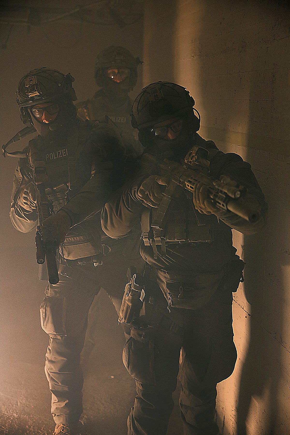 Tactical team advancing through smoke — CQB scenario